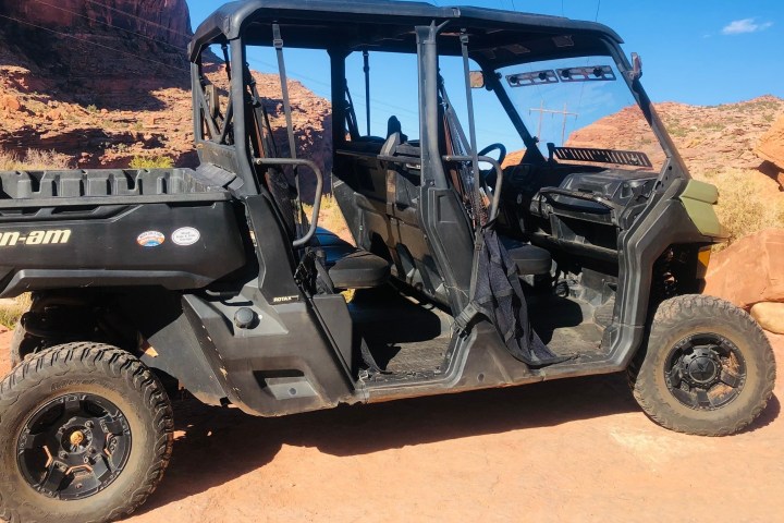 a car parked on the side of a mountain